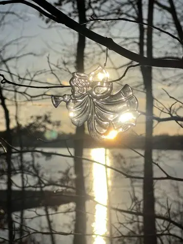 Sun-kissed angel brings peaceful vibes.